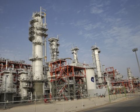 FILE--This March 16, 2019 file photo, shows a natural gas refinery at the South Pars gas field on the northern coast of the Persian Gulf, in Asaluyeh, Iran. China's state oil company has pulled out of a $5 billion deal to develop a portion of Iran's massive offshore natural gas field, the Islamic Republic's oil minister said Sunday, Oct. 6, 2019, an agreement from which France's Total SA earlier withdrew over U.S. sanctions. (AP Photo/Vahid Salemi, File)