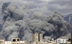 Smoke rises in Tehran after a series of explosions on March 1. Picture: Fatemeh Bahrami/Anadolu via Getty Images.