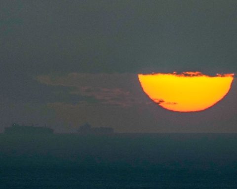 FILE - Ships sail through the Arabian Gulf toward the Strait of Hormuz as the sun sets in the United Arab Emirates Monday, March 23, 2026. (AP Photo, File)
