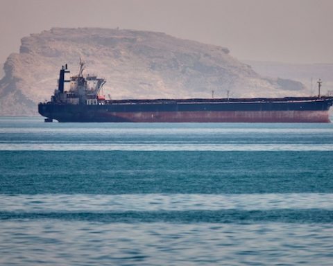 A bulk cargo ship sits at anchor in the Strait of Hormuz off Bandar Abbas, Iran, Saturday, May 2, 2026.(Amirhosein Khorgooi/ISNA via AP)