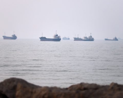 Commercial vessels are seen in the Strait of Hormuz off Bandar Abbas, Iran, Tuesday, June 30, 2026. (Amirhosein Khorgooi/ISNA via AP)