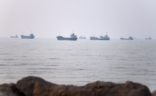 Commercial vessels are seen in the Strait of Hormuz off Bandar Abbas, Iran, Tuesday, June 30, 2026. (Amirhosein Khorgooi/ISNA via AP)