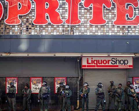 A private security company guards a supermarket against looting after a demonstration against illegal migrants on June 30, 2026 in Yeoville area in central Johannesburg, South Africa