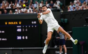 Novak Djokovic of Serbia returns a shot in the Gentlemen's Singles second round match against Stefanos Tsitsipas of Greece on day three of The Championships Wimbledon 2026 at All England Lawn Tennis and Croquet Club on July 01, 2026 in London, England. (Photo by Shi Tang/Getty Images)