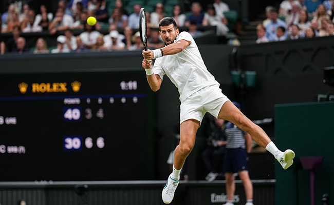 Novak Djokovic of Serbia returns a shot in the Gentlemen's Singles second round match against Stefanos Tsitsipas of Greece on day three of The Championships Wimbledon 2026 at All England Lawn Tennis and Croquet Club on July 01, 2026 in London, England. (Photo by Shi Tang/Getty Images)